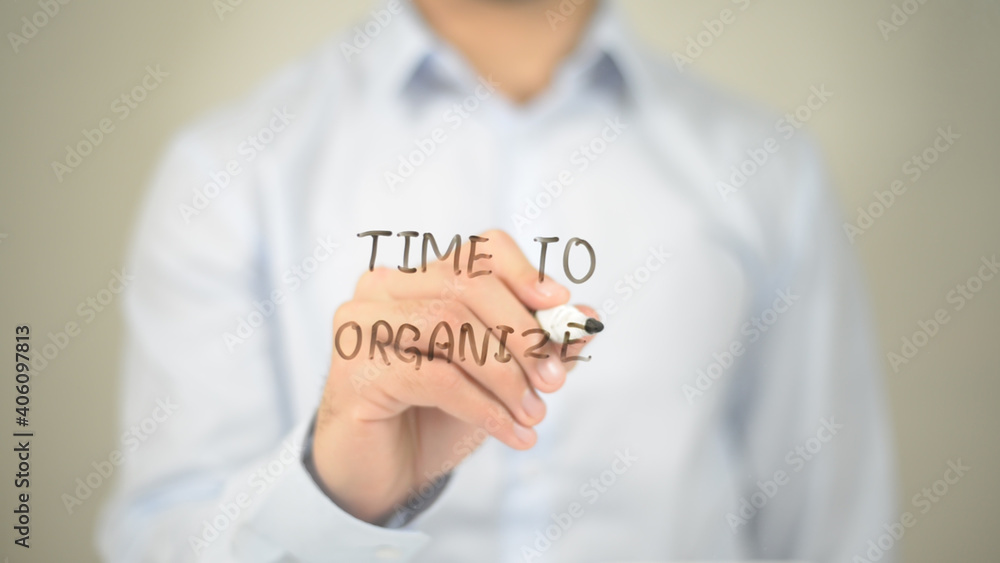 Time To Organize, Man Writing on Transparent Screen Time To Organize, Man Writing on Transparent Screen