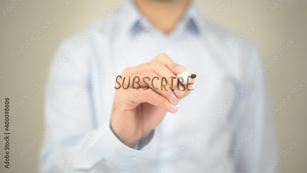 Subscribe, Man Writing on Transparent Screen Subscribe, Man Writing on Transparent Screen