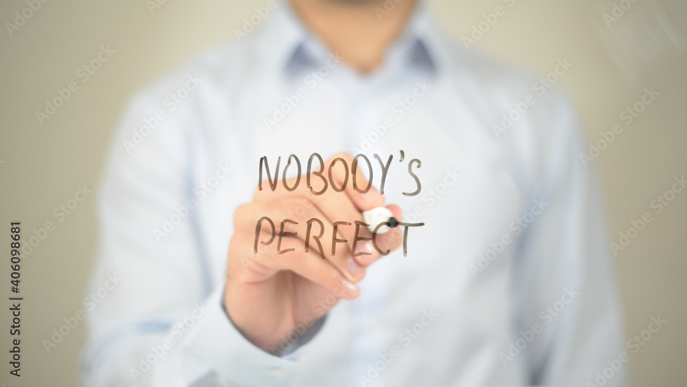 Nobody is Perfect , Man writing on transparent screen Nobody is Perfect , Man writing on transparent screen
