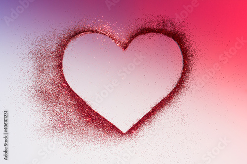 Heart of red bright sparkles in neon lights. Artistic design colorful and shiny bright background