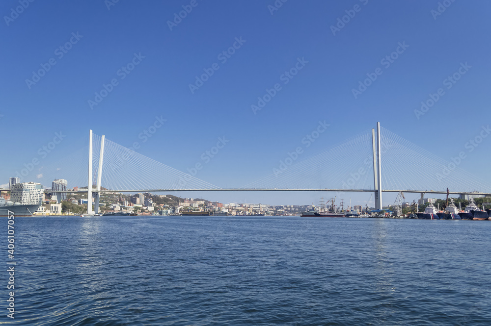 sunny day view of Golden bridge in Vladivostok