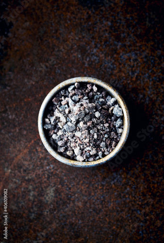 Black Himalayan Salt in a ceramic dish. Fro top