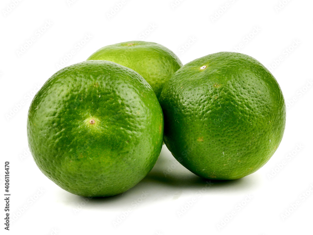 Ripe slice of green lime citrus fruit stand isolated on white background,element of food healthy nutrients and fruit healthy concept Ripe slice of green lime citrus fruit stand isolated on white background,element of food healthy nutrients and fruit healthy concept