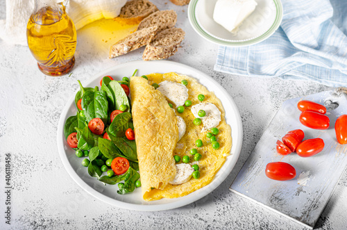 Bio eggs omelet with salad