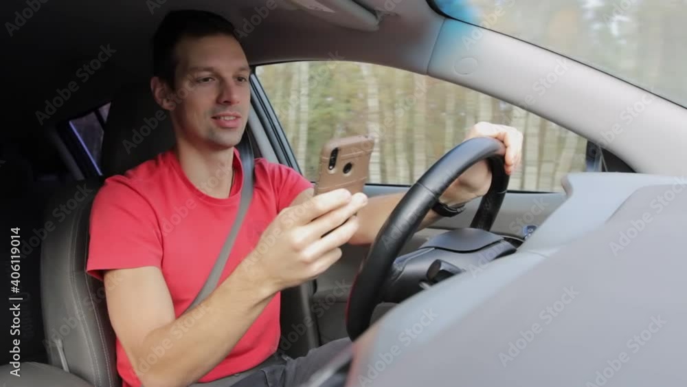Man plays on phone or gets distracted while driving. Unsafe use of phone, accident on road. Fright and shock of vehicle driver at high speed Man plays on phone or gets distracted while driving. Unsafe use of phone, accident on road. Fright and shock of vehicle driver at high speed