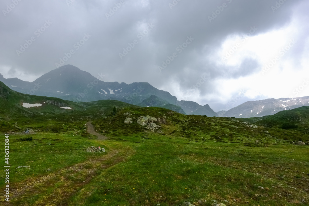 rains clouds in the mountains while hiking rains clouds in the mountains while hiking