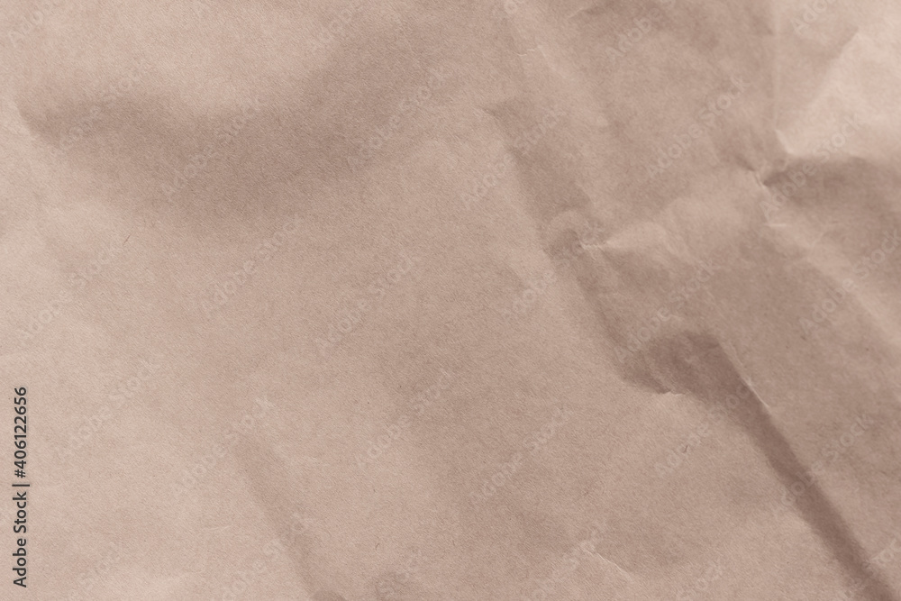 Naklejka premium Texture of crumpled light brown craft paper.
