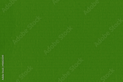 Clean green retro paper background. Vintage cardboard texture. Grunge paper for drawing. Simple blank fabric pattern.