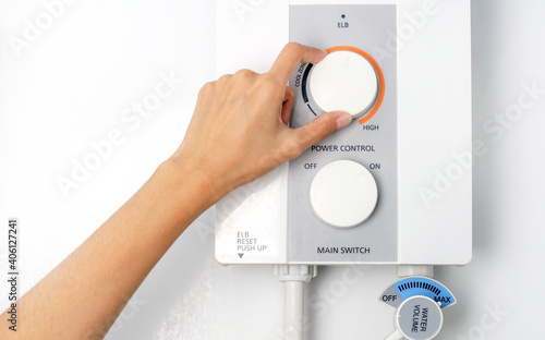 hand rotate temperature adjuster of water heater. temperature of water in Electric Boiler.                              