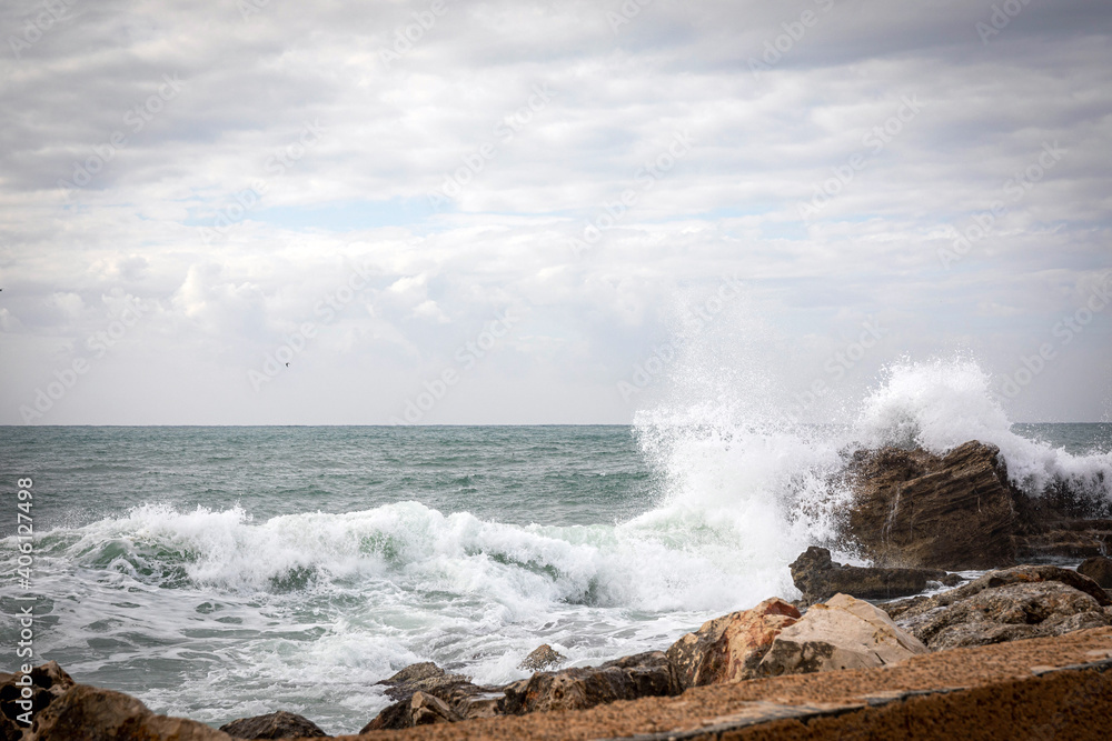 Caesarea. Storm. Sea waves crash against the ruins of the old city of Caesarea.
