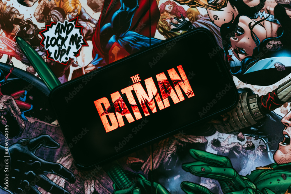 Batman DC FANDOM movie Poster on the iPhone screen with comics background.  Rostov-on-Don, Russia. 1 September 2020 Stock Photo | Adobe Stock