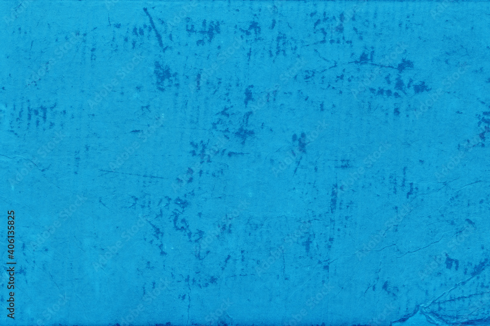 Cardboard blue abstract pattern texture close-up. Retro old paper background. Grunge concrete wall. Vintage blank wallpaper. Cardboard blue abstract pattern texture close-up. Retro old paper background. Grunge concrete wall. Vintage blank wallpaper.