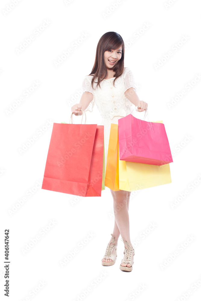Portrait of a happy young woman shopping Portrait of a happy young woman shopping