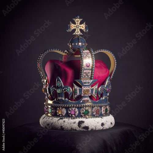 Royal golden crown with jewels on pillow on black background. Symbols of UK United Kingdom monarchy. photo