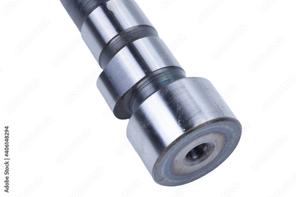 Truck camshaft on white. Industrial concept. close-up, engineering, service concept Truck camshaft on white. Industrial concept. close-up, engineering, service concept