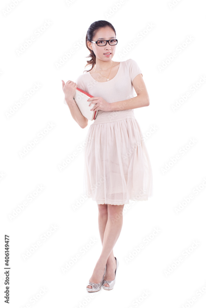 A Young woman standing, hugging a book A Young woman standing, hugging a book