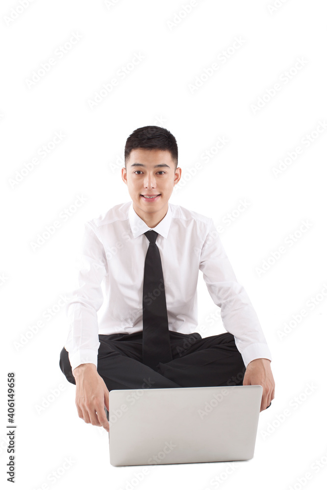 Portrait of young bisinessman sitting in the front of laptop Portrait of young bisinessman sitting in the front of laptop