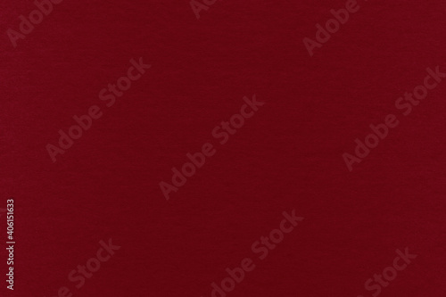 Clean red retro paper background. Vintage cardboard texture. Grunge paper for drawing. Simple blank fabric pattern.