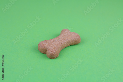 dog food bones on green background pattern