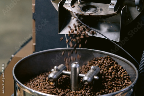 coffee beans freshly roasted on a cooling drum
