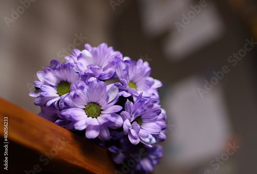 festive bouquet with chrysanthemums on a blurred background