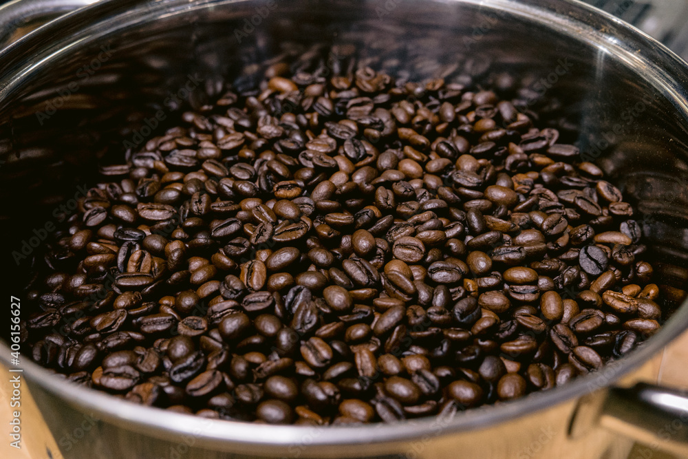 coffee beans freshly roasted on a cooling drum coffee beans freshly roasted on a cooling drum