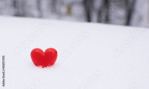 Bright red hearts on natural white snow. Copy space. Happy Valentine day and love concept.Greeting card  mock-up