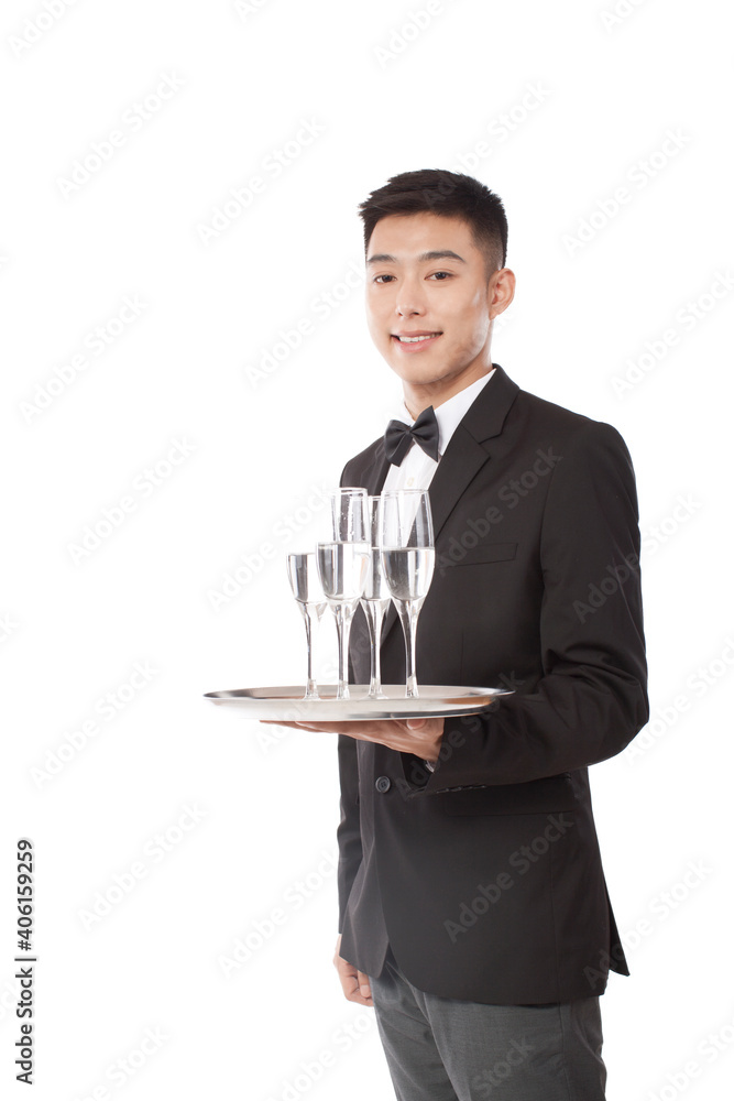 Young Waiter holding up tray of drinks,portrait Young Waiter holding up tray of drinks,portrait