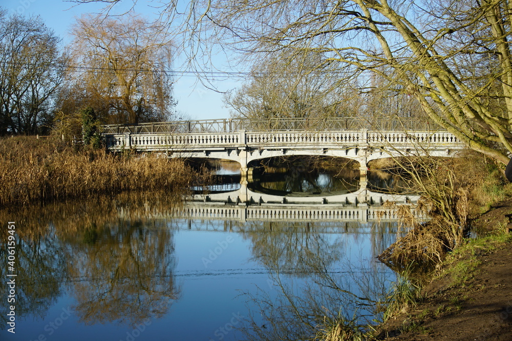 White bridge over river Strout, Melford Country Park, Suffolk, Sudbury, January 2021 White bridge over river Strout, Melford Country Park, Suffolk, Sudbury, January 2021