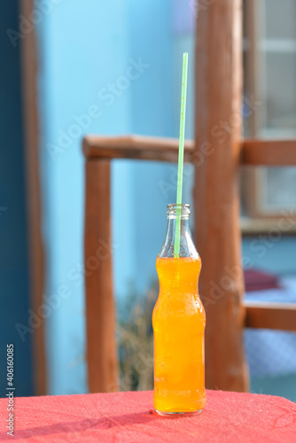 Orange soda in India with plastic sorbet