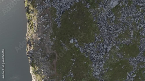 Impressive cliff taken from above during the sunset, Segla mountain,Norway photo