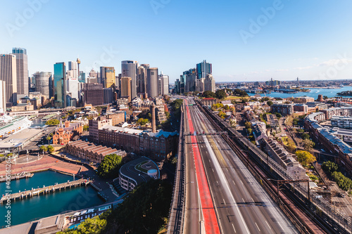 Roads leading into Sydney with blurred traffic making streets look empty © James