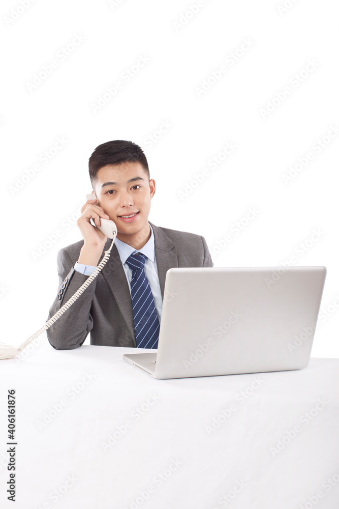 Portrait of young bisinessman using cell phone Portrait of young bisinessman using cell phone