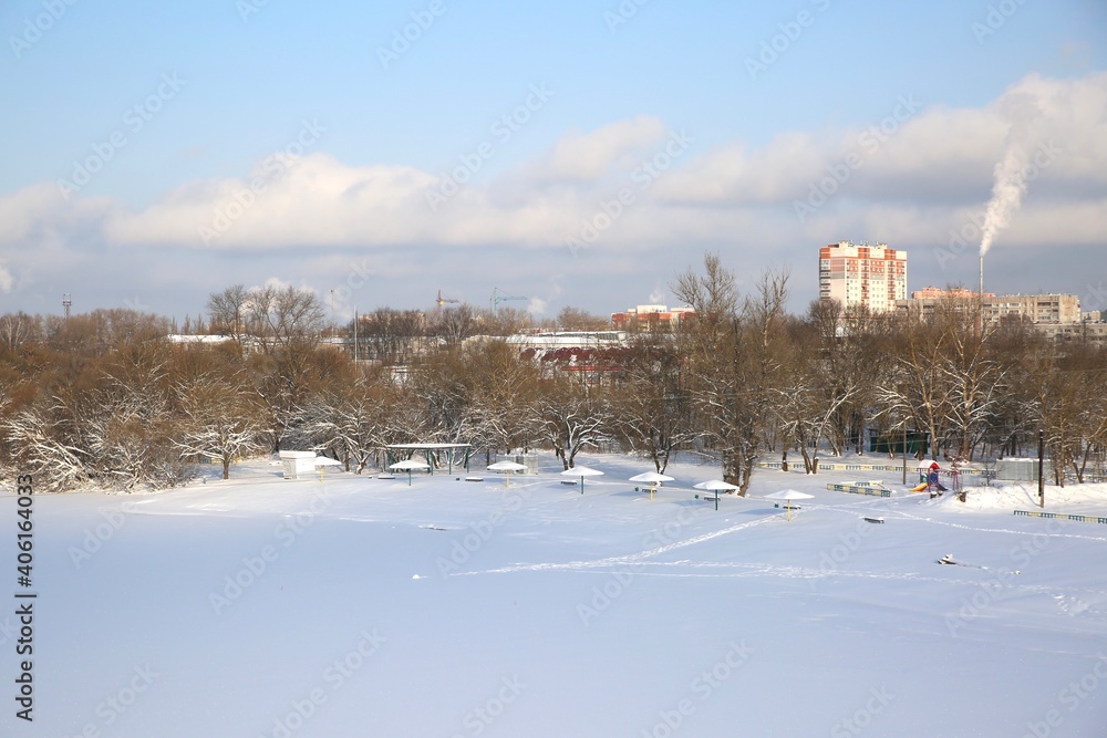 Winter cityscape in sunny weather.