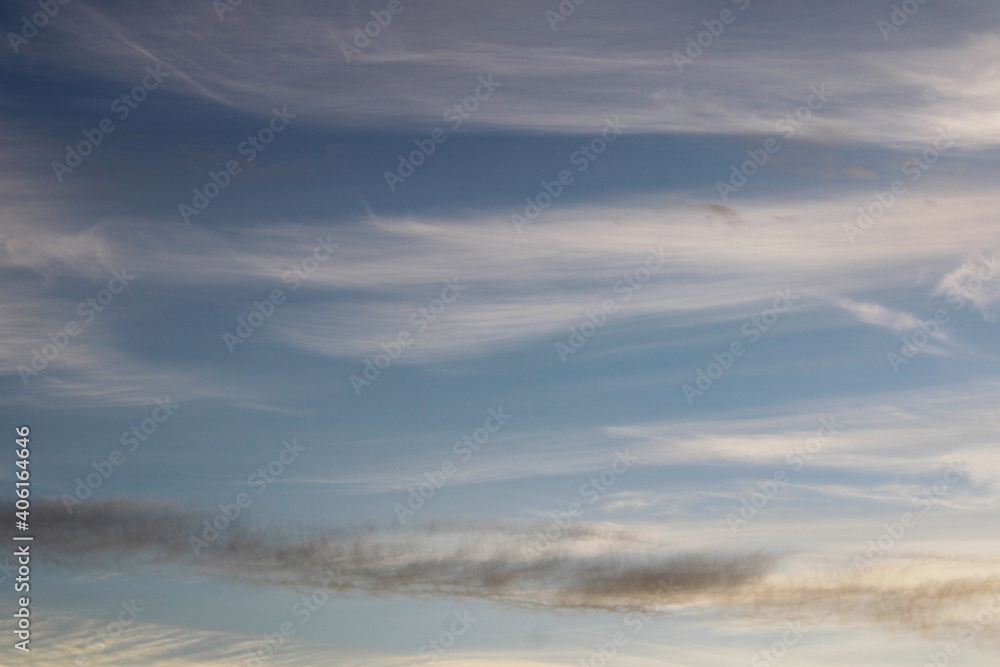 Soft White Wispy Clouds in Blue Sky Soft White Wispy Clouds in Blue Sky
