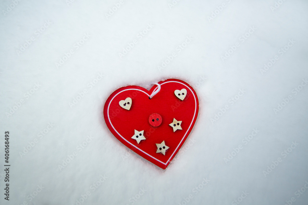 wooden photo frame heart lies on the snow wooden photo frame heart lies on the snow