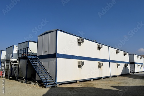 Portacabin, porta cabin, temporary labors camp , Mobile building in industrial site or office container Portable house and office cabins. Labor Camp. Porta cabin. small temporary houses