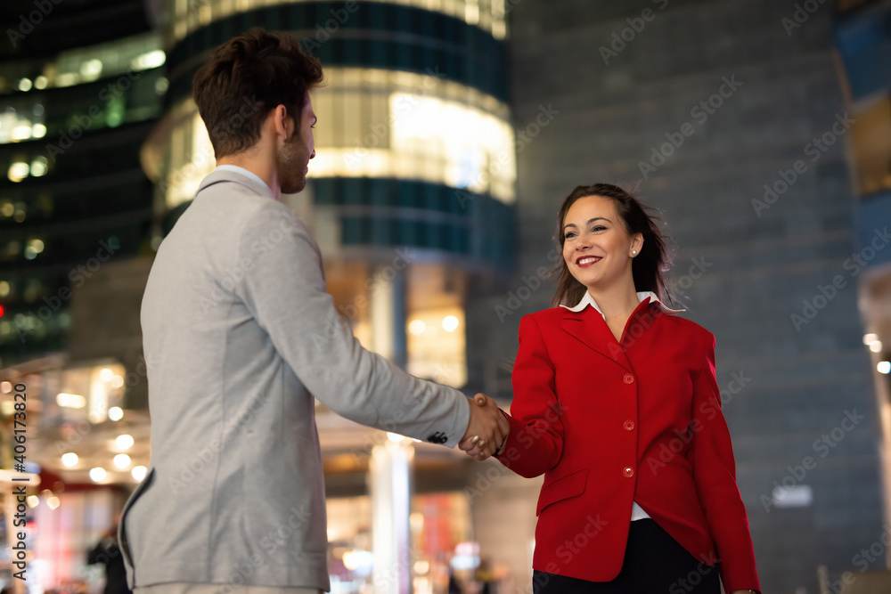 Handshake between business people outdoor Handshake between business people outdoor