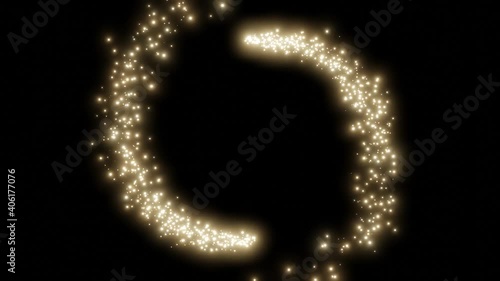 Glittering golden meteors tails going around.Glowing sparkle particles.Decorative shiny festive design element for celebtarion, loading or countdown. Magic glowing dust effect photo