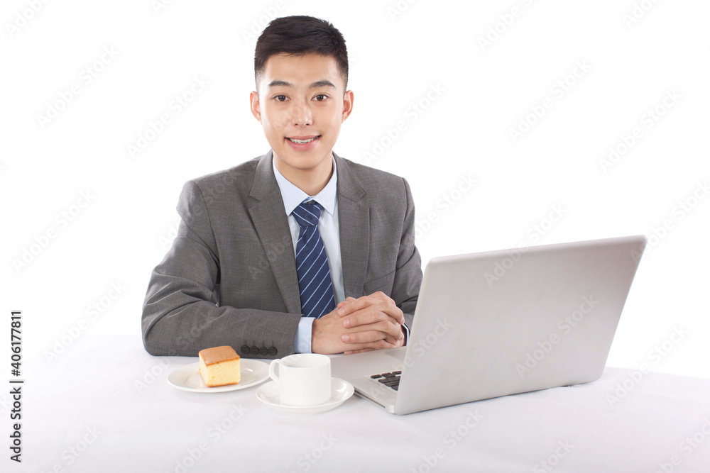 Portrait of young bisinessman sitting in the front of laptop Portrait of young bisinessman sitting in the front of laptop