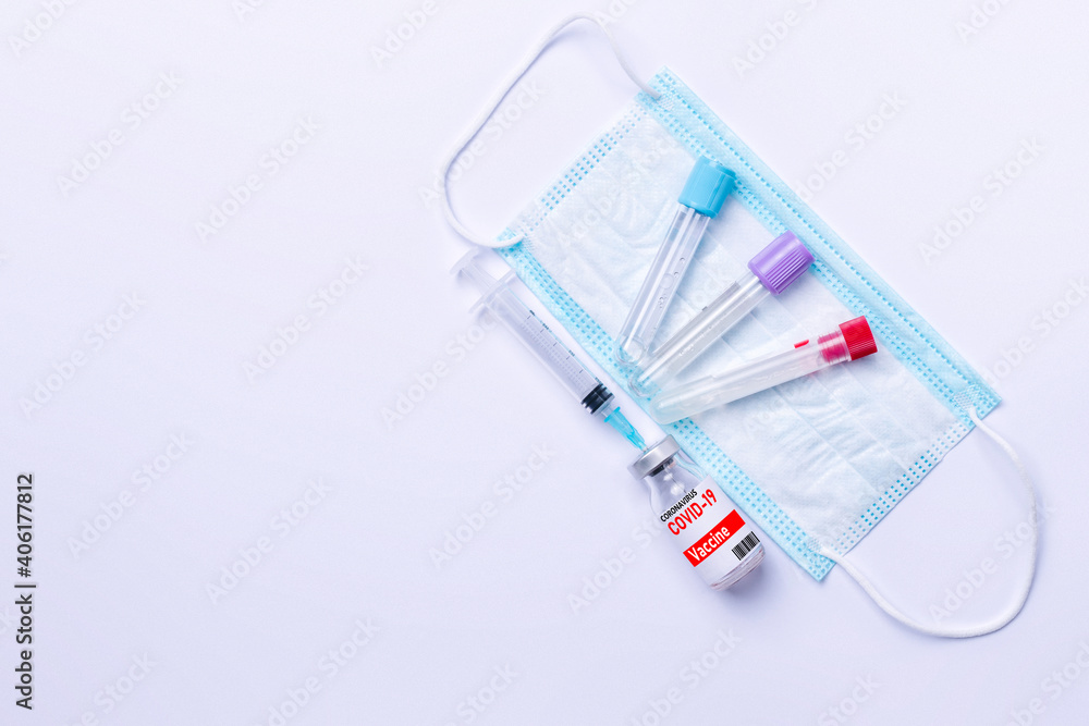 The concept of combating coronavirus. Medical mask, tests and vaccine against covid 19. The concept of combating coronavirus. Medical mask, tests and vaccine against covid 19.