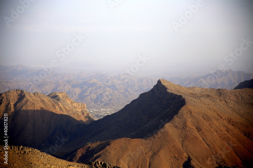 View of the mountains with a glimpse of the city below  Jabal Akhdar  towards Nizwa  Oman