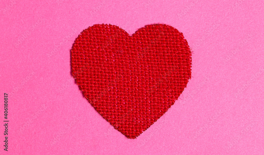 Red Burlap Heart on a Pink Background