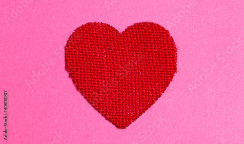 Red Burlap Heart on a Pink Background