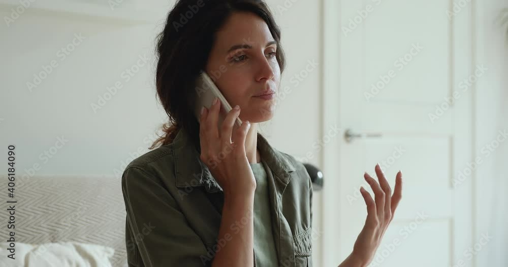 Happy young pretty woman talking gossiping on cellphone with friends, smiling cheerful female caller enjoying pleasant distant conversation with parents at home, sharing life news. technology concept. Happy young pretty woman talking gossiping on cellphone with friends, smiling cheerful female caller enjoying pleasant distant conversation with parents at home, sharing life news. technology concept.