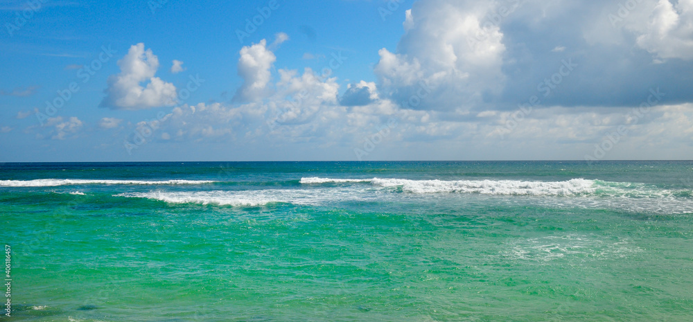 Obraz premium Exotic water landscape with clouds on horizon. Natural tropical water paradise. Wide photo.