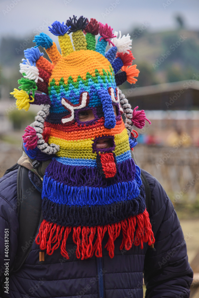 Masked participant at the wild Virgen del Carmen Festival, held in Pisac and Paucartambo, Peru