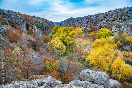 Aktovsky Canyon in Ukraine surrounded large stone boulders © YouraPechkin