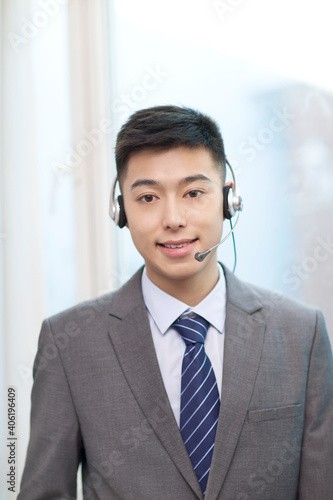 Portrait of young Business man wearing headphones