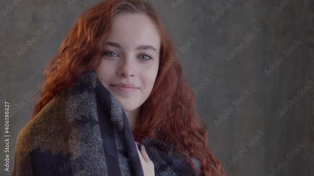 beautiful girl with red hair posing on the background with a cape
beautiful girl with red hair posing on the background with a cape
